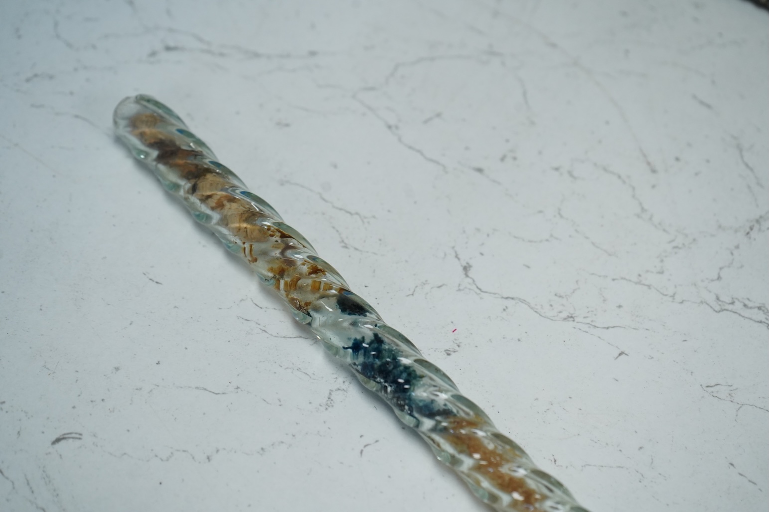 A 19th century Nailsea spiral walking stick, decorated with fine coloured beads, 128cm in length